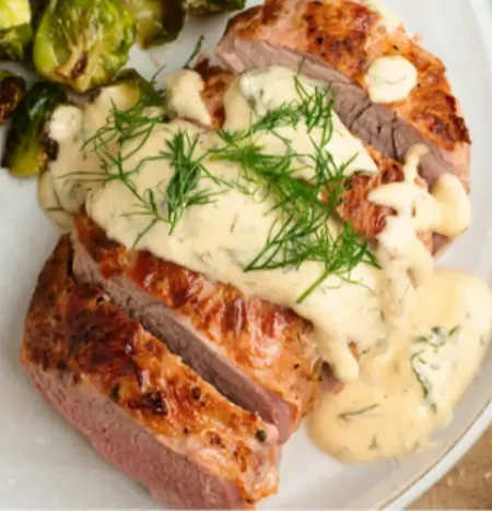 Pork tenderloin with creamy dill sauce